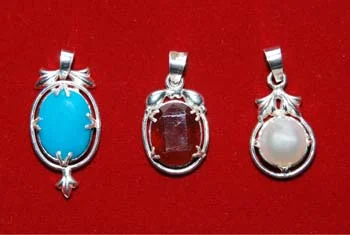 Astrological Gemstone Silver Pendants from Sri Karpagambal Jewellery